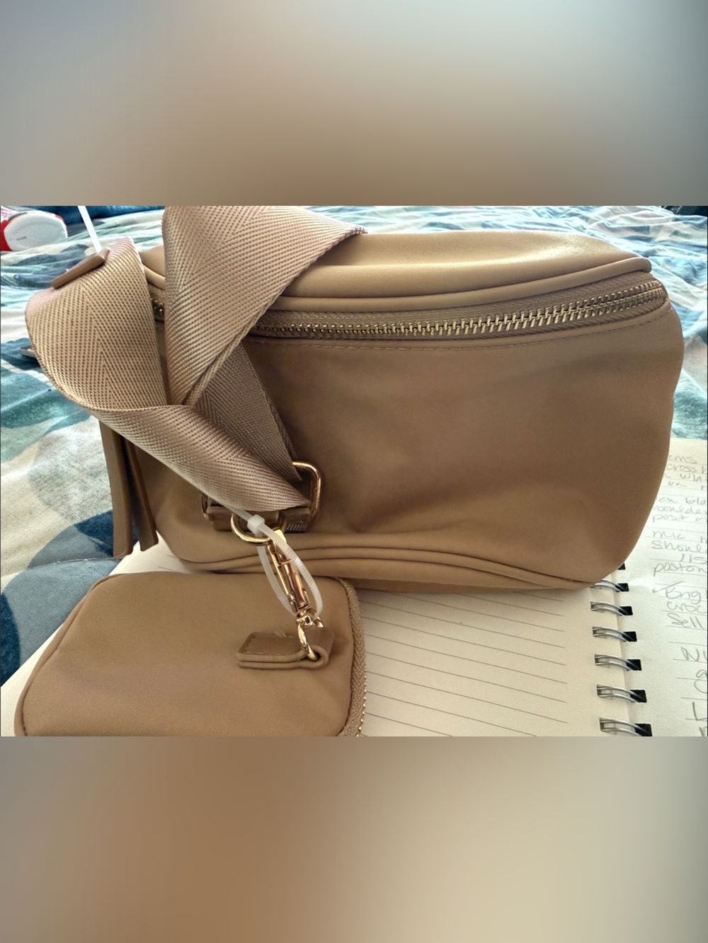 Sleek Tan Crossbody Bag with Adjustable Strap and Gold Hardware